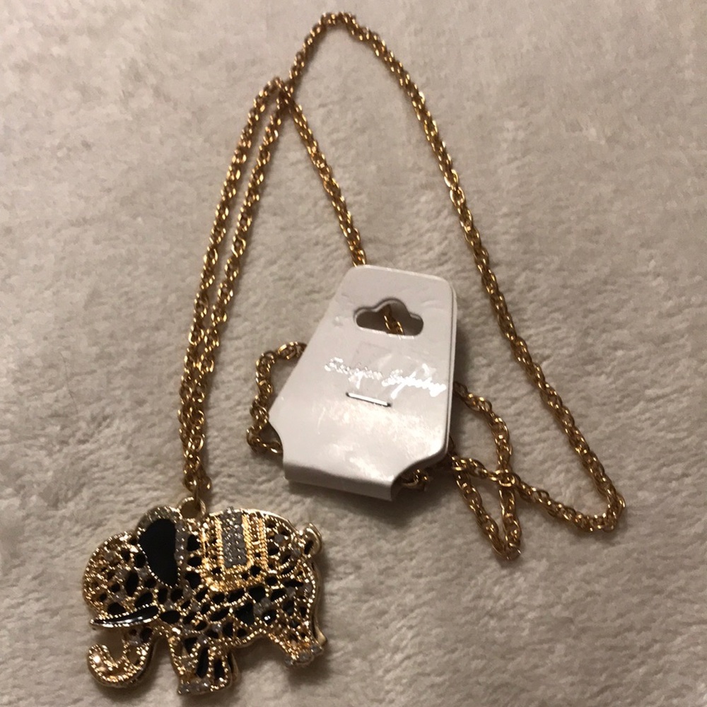 NWT elephant necklace.